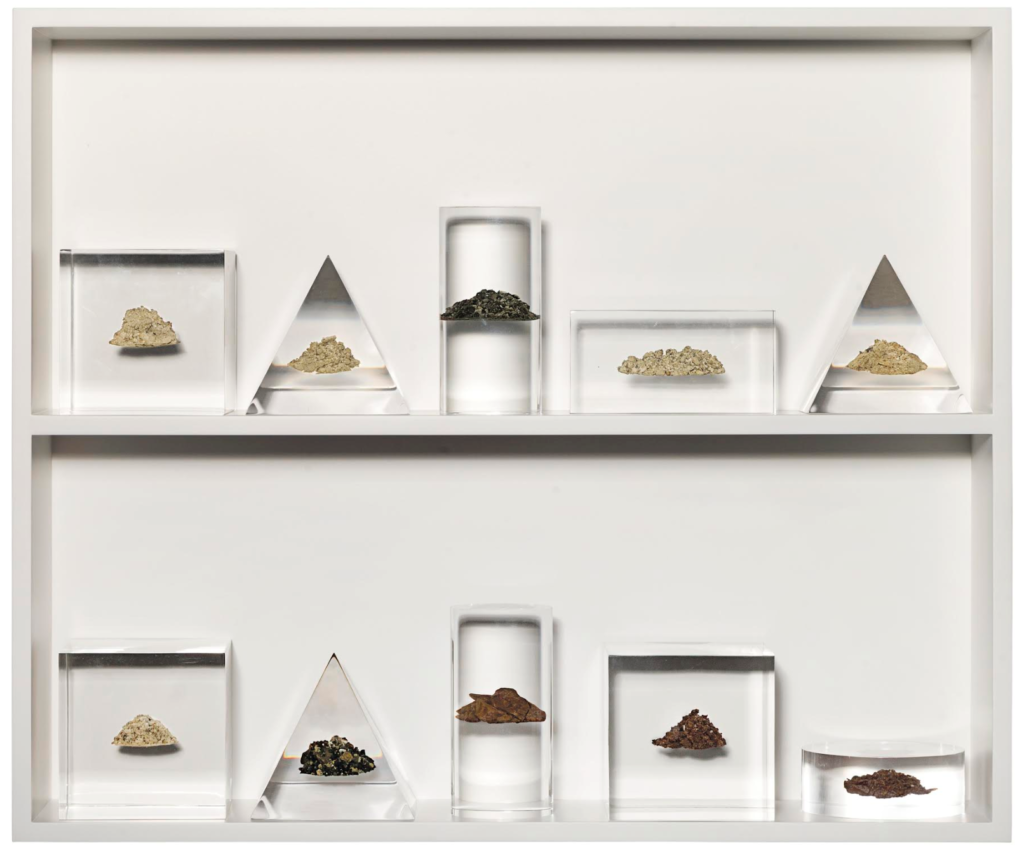 Ben Thorp Brown, Academic Forms with Rocks, Lucite, rock strata sampled at intervals of 10′ ranging from 10′ to 100′ of depth in the West Texas desert, on wood shelf overall: 20 x 24 in., 2016. Donated by the artist.