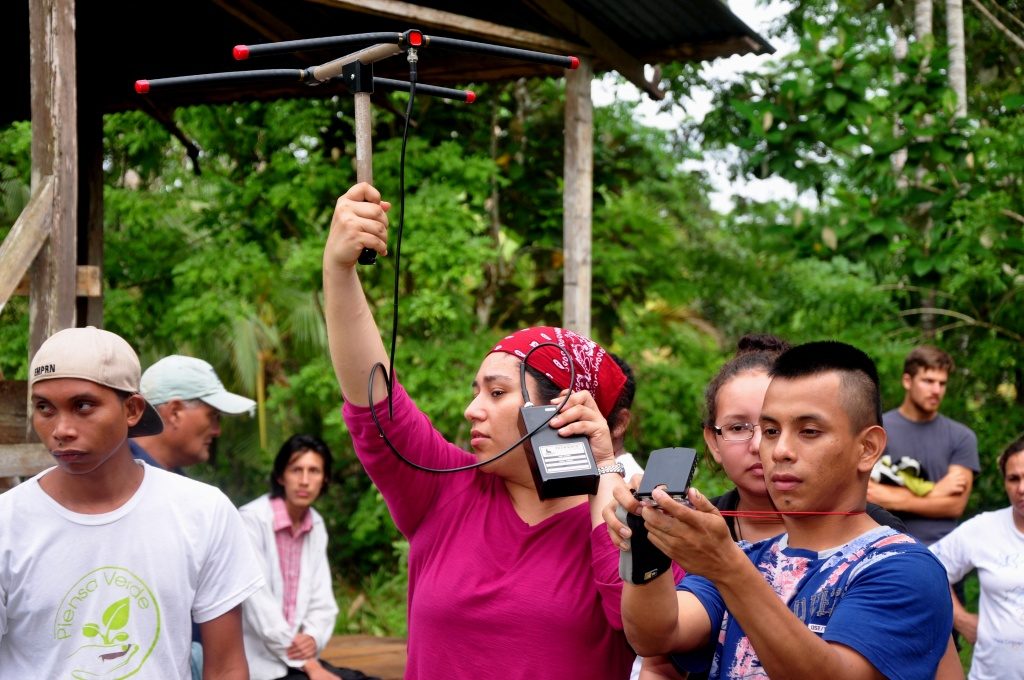 A student participates in a brief demonstration of telemetry equipment and triangulation. (Photo by Chris Jordan)