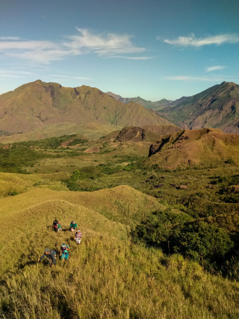 TCP Rangers on a morning patrol in Mts. Iglt-Baco National Park. (Photo by: J. Slade, Global Wildlife Conservation)