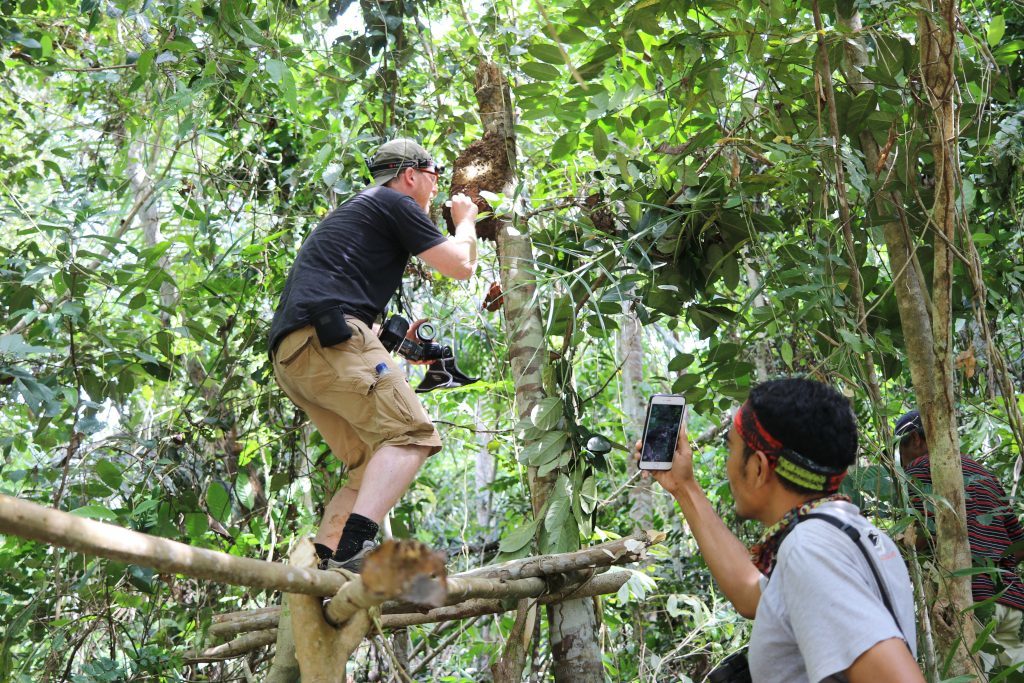 Scientist films natural history photographer