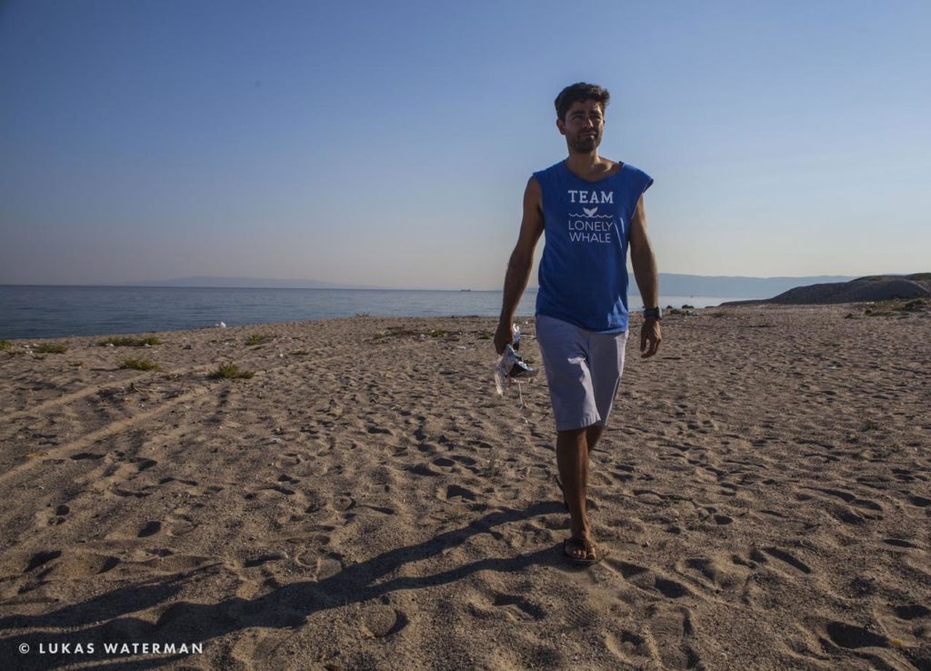 Adrian Grenier walks the beach. (Photo by Lukas Waterman)