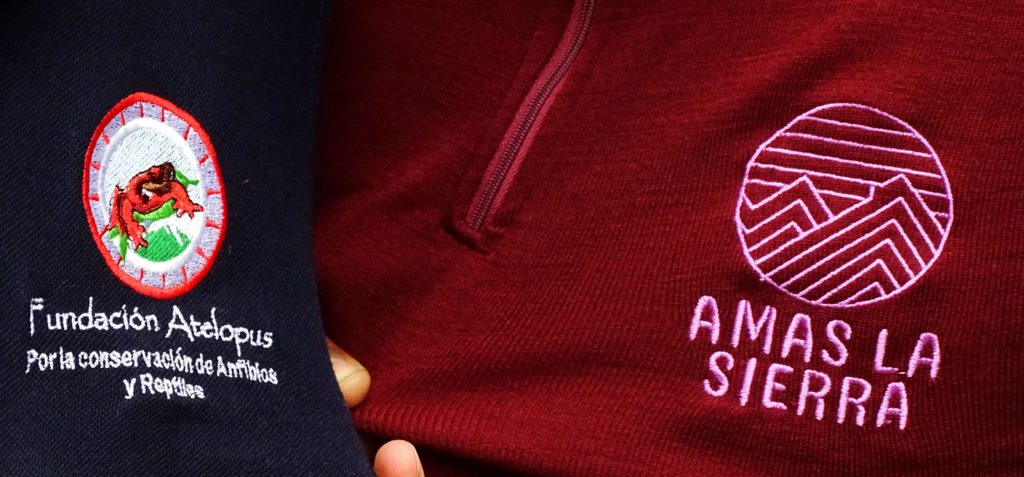Fundacion Atelopus and Amas la Sierra logos showcasing their partnership
