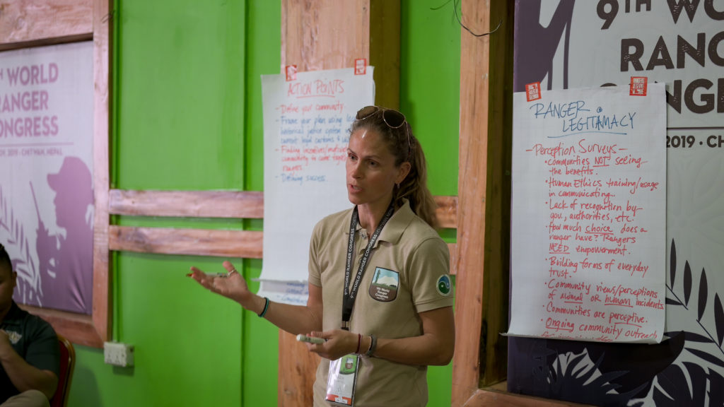 Cara Martel presenting to a group at the World Ranger Congress in Chitwan.