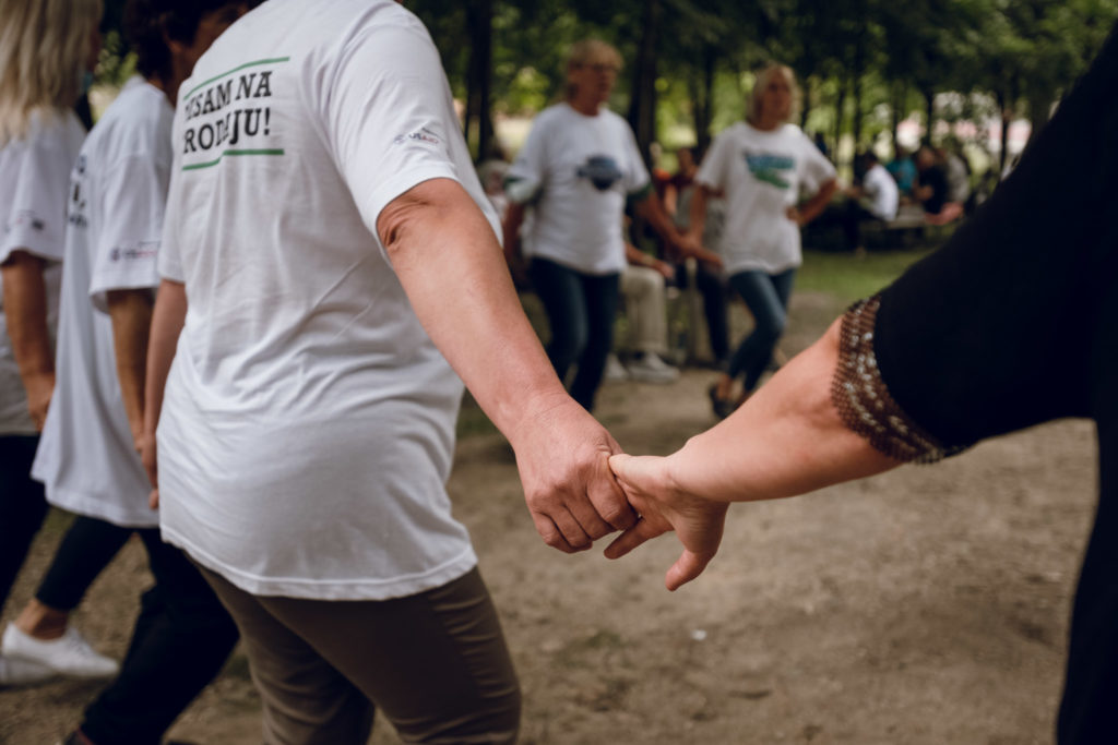 Brave Women of Kruscica hold hands.