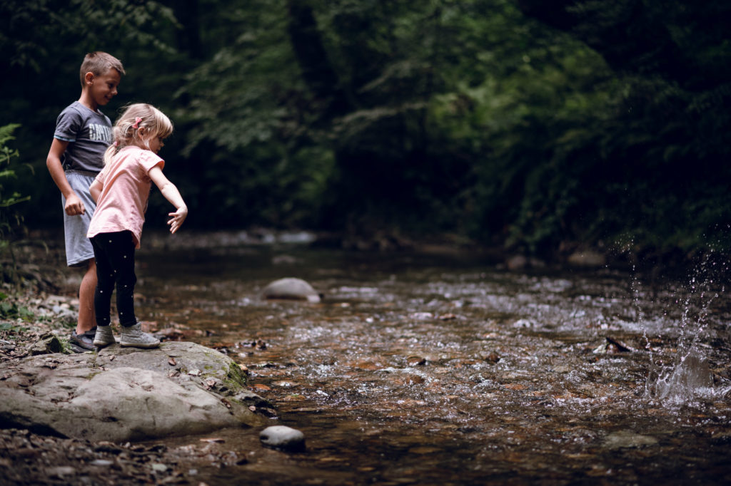 Children playing on the bank of the Kruščica River.